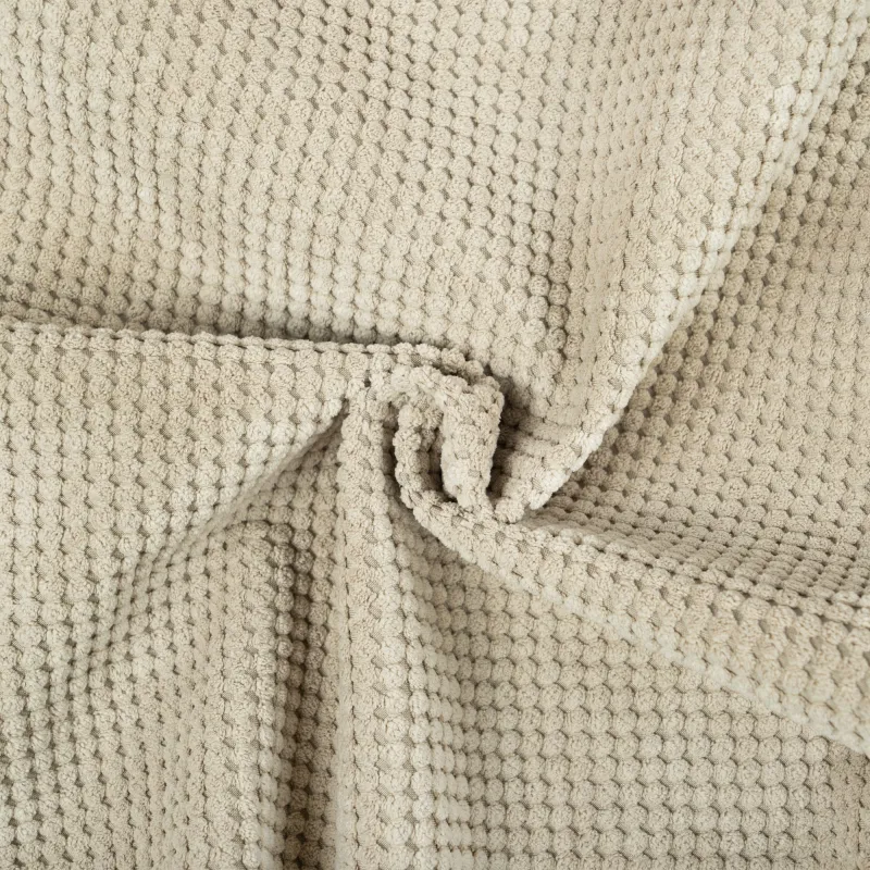 Puff beige versátil, ideal para salones o dormitorios