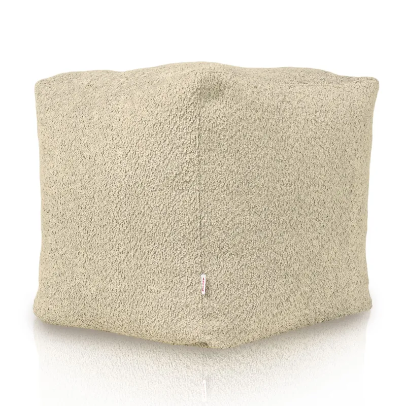 Puff suave en beige de boucle para áreas acogedoras