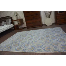 Alfombra DROP JASMINE 030 en tonos azules, perfecta para cualquier habitación moderna