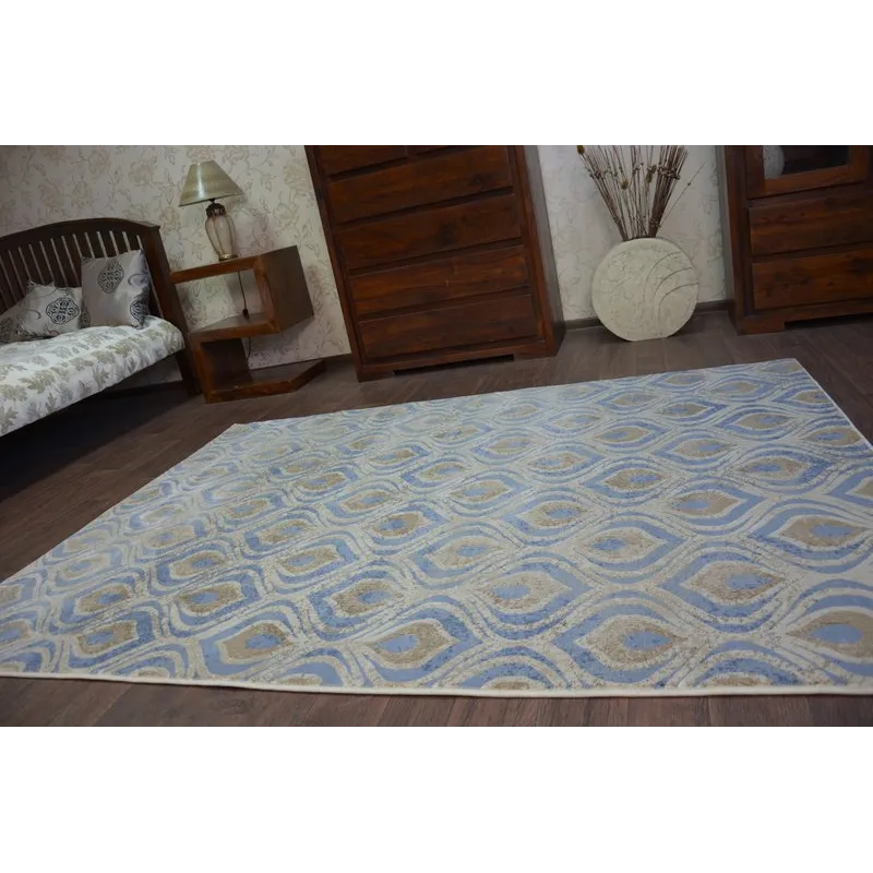 Alfombra DROP JASMINE 030 en tonos azules, perfecta para cualquier habitación moderna