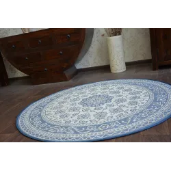 Alfombra boho con acentos azules, ideal para la habitación de los niños