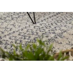 Alfombra circular crema y gris, perfecta para la sala de estar