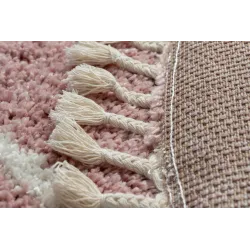 Alfombra redonda con flecos, ideal para interiores elegantes en casa