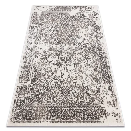 Alfombra vintage beige con diseño clásico de roseta, perfecta para salones