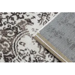 Alfombra vintage suave beige, perfecta para dormitorios