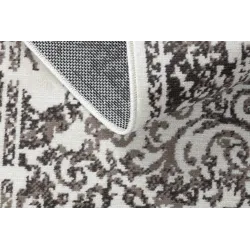 Alfombra vintage beige, perfecta para uso exterior o en terrazas
