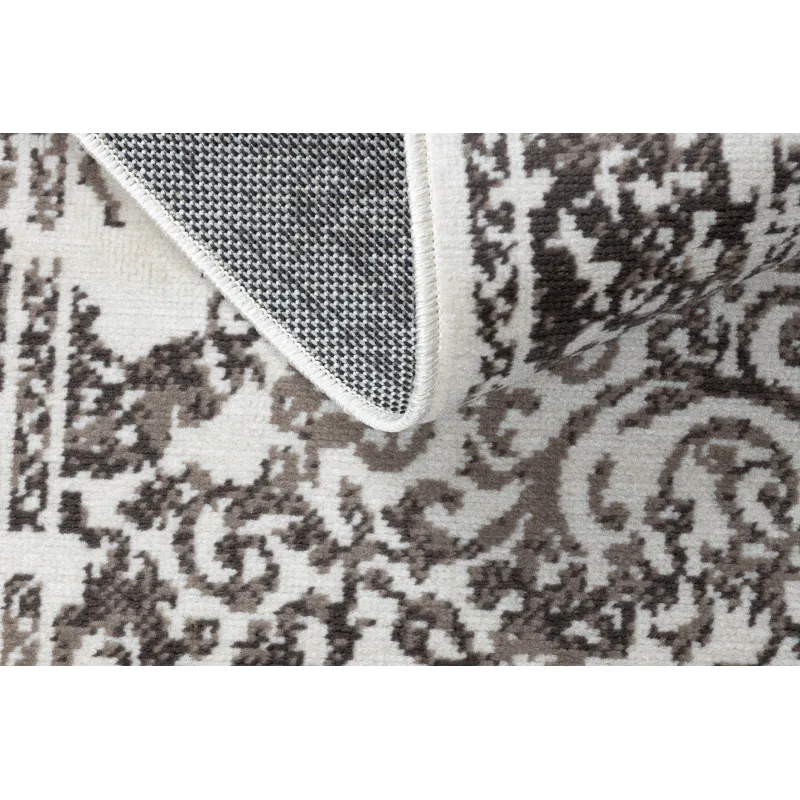 Alfombra vintage beige, perfecta para uso exterior o en terrazas