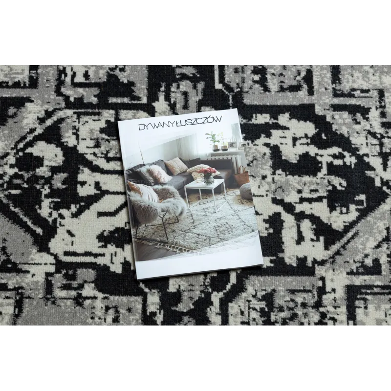 Alfombra elegante vintage gris y negro, ideal para la sala de estar