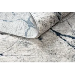 Alfombra moderna REBEC con franjas, ideal para decorar un jardín o una terraza
