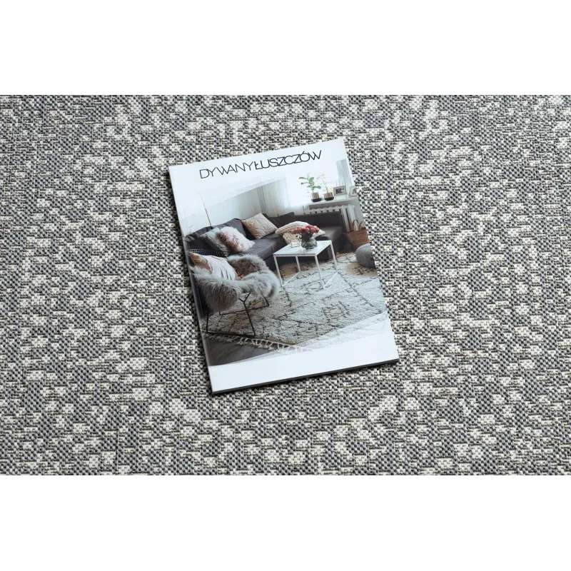 Alfombra circular de sisal gris, un elegante complemento para el salón