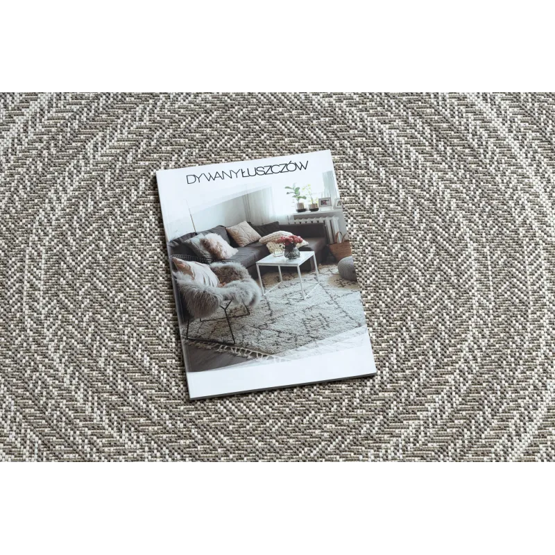 Alfombra redonda de sisal beige, ideal para interiores modernos