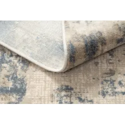 Alfombra NAIN versátil en beige y azul oscuro, diseño vintage, ideal para jardín o terraza