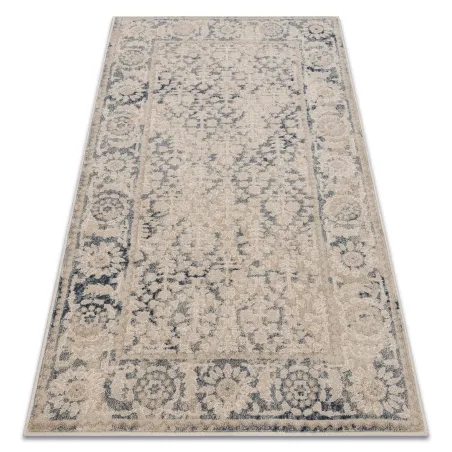 Alfombra NAIN en beige y azul oscuro con diseño vintage