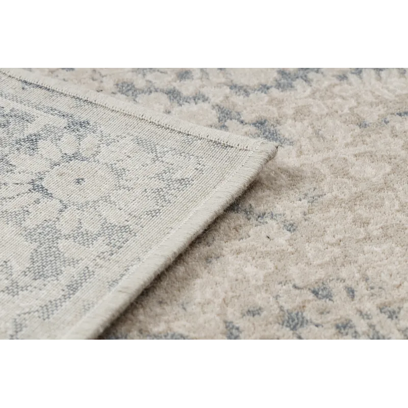 Alfombra NAIN suave con diseño vintage en tonos suaves