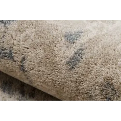Alfombra NAIN para el dormitorio en tonos vintage suaves