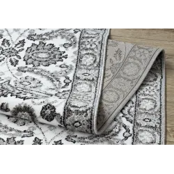 Alfombra estructural gris con flores para el dormitorio