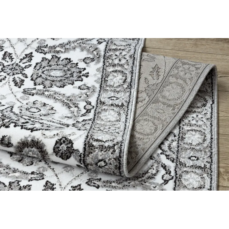 Alfombra estructural gris con flores para el dormitorio