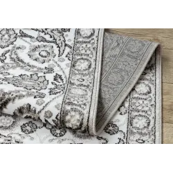 Alfombra de alta calidad con diseño estructural gris y beige, duradera