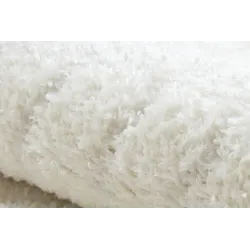Alfombra crema, perfecta para habitaciones infantiles o áreas de juego