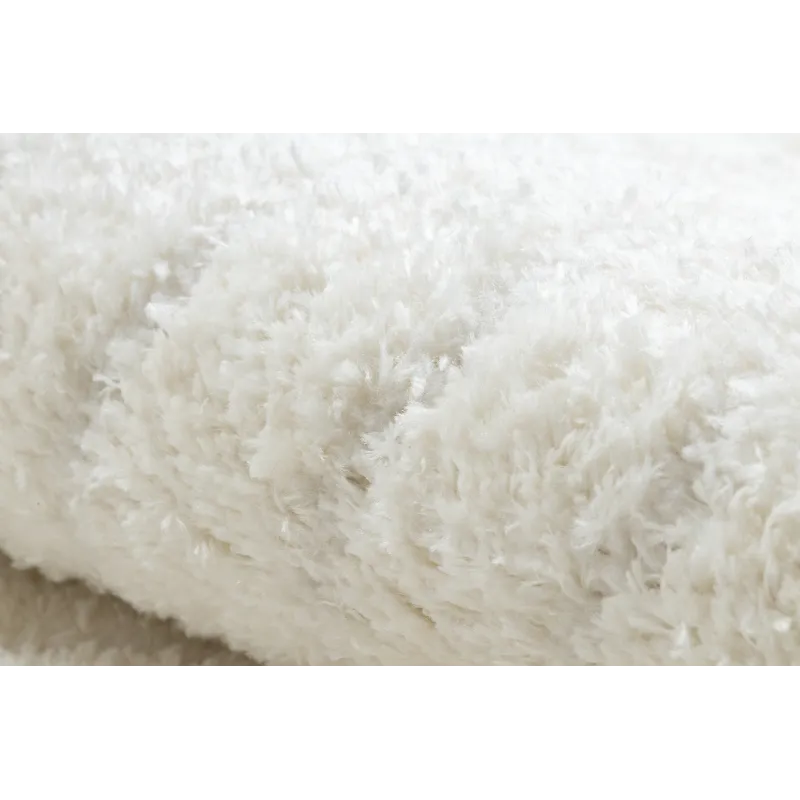 Alfombra crema, perfecta para habitaciones infantiles o áreas de juego