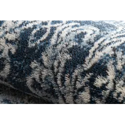 Alfombra NAIN elegante, perfecta para interiores sofisticados en azul oscuro