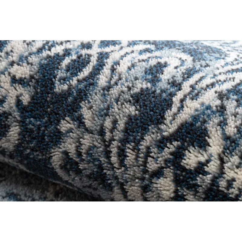 Alfombra NAIN elegante, perfecta para interiores sofisticados en azul oscuro