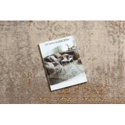 Alfombra beige, ideal para decoraciones modernas y elegantes