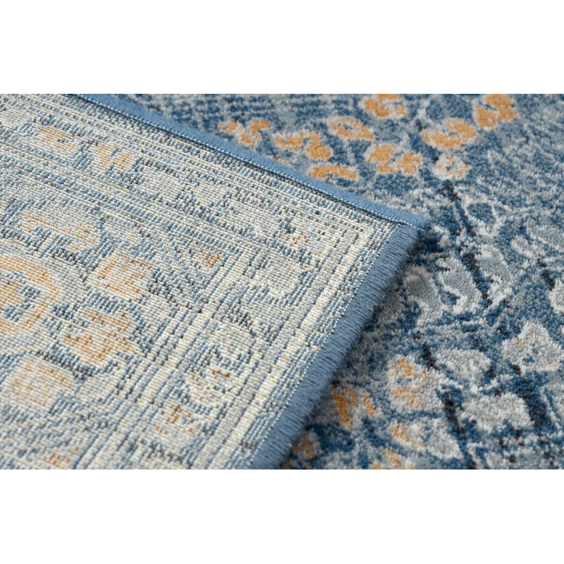 Alfombra suave de lana con textura rica y diseño