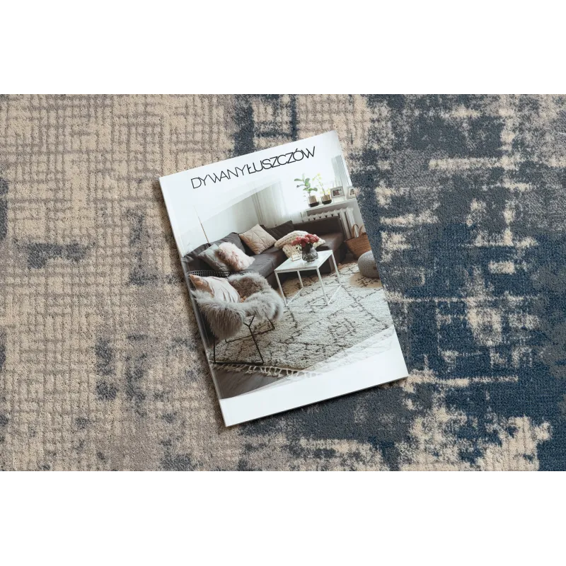 Alfombra en tonos beige y azul, ideal para el salón contemporáneo