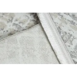 Alfombra suave y texturizada, ideal para la comodidad del salón o dormitorio