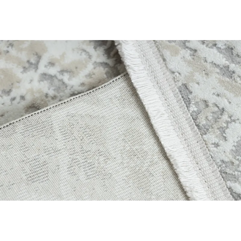 Alfombra suave y texturizada, ideal para la comodidad del salón o dormitorio