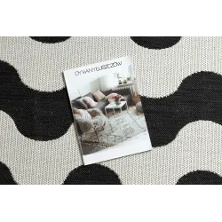Alfombra elegante con diseño de olas, ideal para la sala de estar