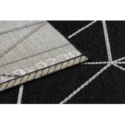Alfombra de sisal texturizada negra y plateada, que aporta elegancia a cualquier espacio