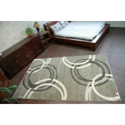 Alfombra moderna en tonos beige y marrón, ideal para cualquier espacio